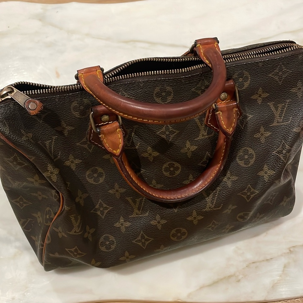 Louis Vuitton speedy bag with cute brown leather handles, make me an offer!